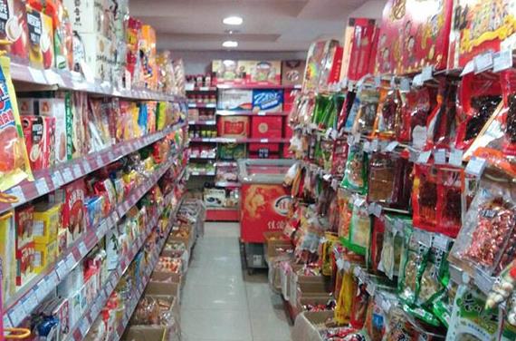 开一个小区门口的超市挣钱么？配图