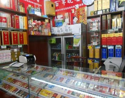 为何街边的烟酒店平时没什么人却还不关店呢?挣钱么?配图 为何街边的烟酒店平时没什么人却还不关店呢?挣钱么?配图