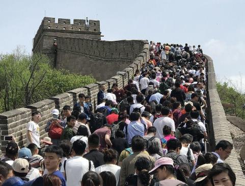 今年五一假期是出去花钱还是在家挣钱？配图
